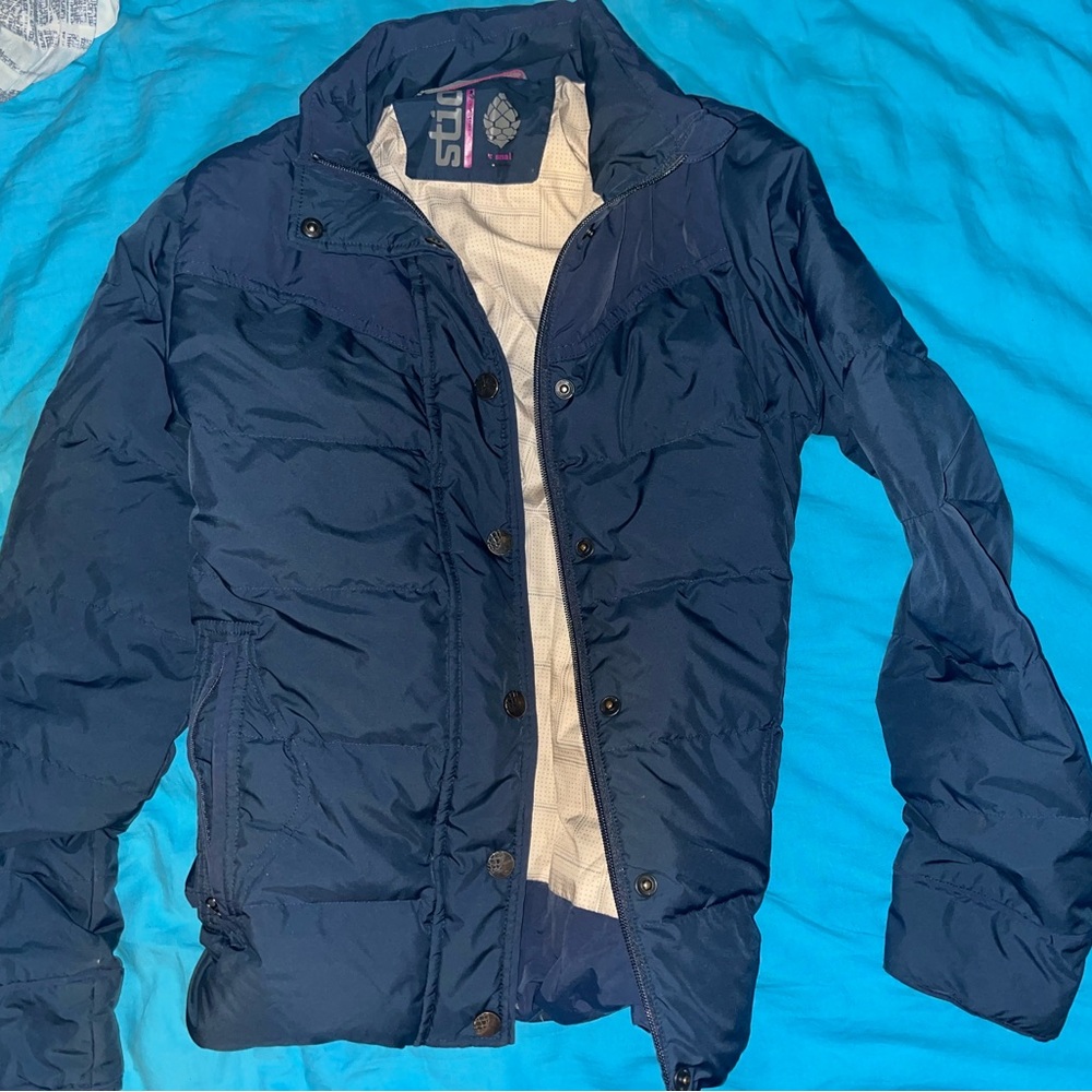 Navy and cream puffer jacket. perfectly fine. reminds me of my ex. snatched look